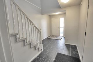 Photo 11: 88 Coachway Gardens SW in Calgary: Coach Hill Row/Townhouse for sale : MLS®# A1205157