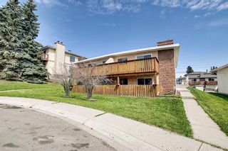 Photo 3: 223 HUNTINGTON PARK BA NW in Calgary: Huntington Hills Multi-Family for sale : MLS®# C4296594