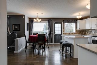 Photo 10: 56 Strathridge Close SW in Calgary: Strathcona Park Detached for sale : MLS®# A1245325