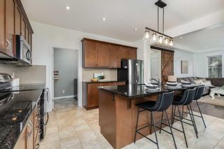 Photo 12: 535 Windbrook Heights SW: Airdrie Detached for sale : MLS®# A2144026