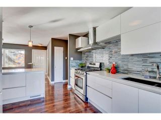 Photo 4: 5612 LADBROOKE Drive SW in Calgary: Lakeview House for sale : MLS®# C4036600