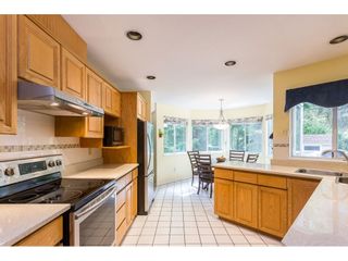 Photo 2: 1307 CAMELLIA Court in Port Moody: Mountain Meadows House for sale : MLS®# R2380794
