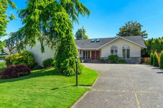 Photo 4: 27056 25 Avenue in Langley: Aldergrove Langley House for sale : MLS®# R2693680