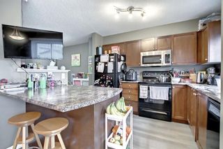Photo 2: 82 Eversyde Common SW in Calgary: Evergreen Row/Townhouse for sale : MLS®# A2013485