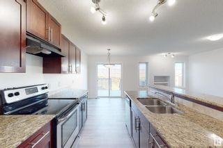 Photo 5: 7301 ARMOUR Crescent in Edmonton: Zone 56 House Half Duplex for sale : MLS®# E4314626