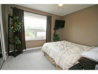 Photo 12: 151 123 QUEENSLAND Drive SE in CALGARY: Queensland Townhouse for sale (Calgary)  : MLS®# C3627911
