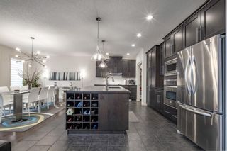 Photo 10: 129 Springbluff Boulevard SW in Calgary: Springbank Hill Detached for sale : MLS®# A2113789