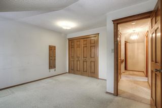 Photo 35: 7 Coach Gate Way SW in Calgary: Coach Hill Detached for sale : MLS®# A2045451