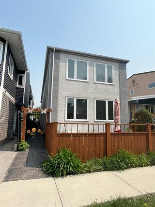 Main Photo: 2 728 4A Street NE in Calgary: Renfrew Semi Detached (Half Duplex) for sale : MLS®# A2116594