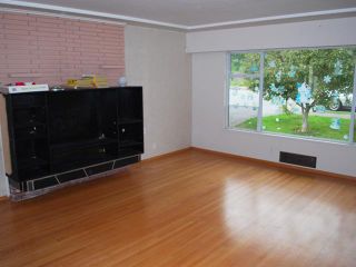 Photo 3: 1448 E 62ND Avenue in Vancouver: Fraserview VE House for sale (Vancouver East)  : MLS®# V856720