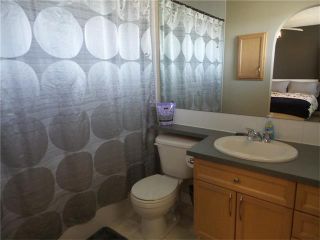 Photo 16: 97 CRYSTAL SHORES Cove: Okotoks House for sale : MLS®# C4113551