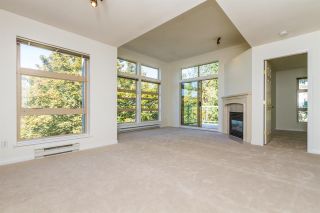 Photo 1: 409 301 MAUDE Road in Port Moody: North Shore Pt Moody Condo for sale in "HERITAGE GRAND" : MLS®# R2102815