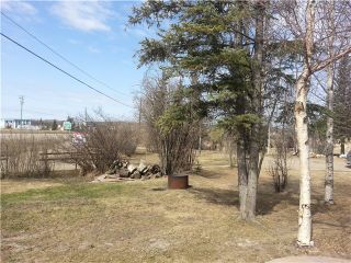 Photo 19: 12672 MUKLUK FRONTAGE Road in Charlie Lake: Lakeshore House for sale in "CHARLIE LAKE" (Fort St. John (Zone 60))  : MLS®# N235441
