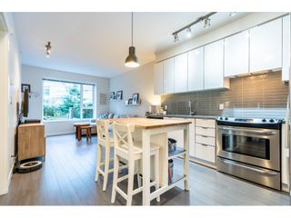 Photo 3: 101 9168 SLOPES Mews in Burnaby: Simon Fraser Univer. Condo for sale in "VERITAS BY POLYGON" (Burnaby North)  : MLS®# R2443492