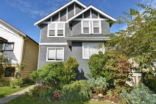 Photo 1: 1083 E 14TH Avenue in Vancouver: Mount Pleasant VE House for sale in "MOUNT PLEASANT" (Vancouver East)  : MLS®# R2107241