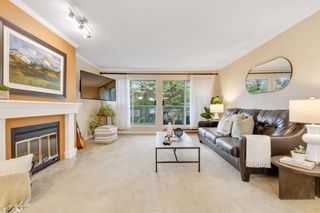 Photo 2: 304 2733 ATLIN Place in Coquitlam: Coquitlam East Condo for sale in "ATLIN COURT" : MLS®# R2820393