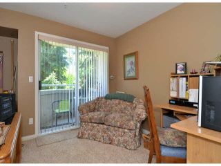 Photo 11: 217 7161 121ST Street in Surrey: West Newton Condo for sale in "The Highlands" : MLS®# F1418736