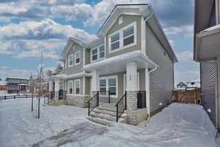 Photo 1: 108 Heartland Boulevard: Cochrane Semi Detached (Half Duplex) for sale : MLS®# A2028931