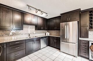 Photo 9: 2 64 Woodacres Crescent SW in Calgary: Woodbine Row/Townhouse for sale : MLS®# A1131075