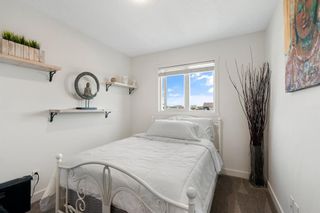 Photo 23: 384 Belmont Avenue SW in Calgary: Belmont Row/Townhouse for sale : MLS®# A2052359