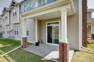 Photo 2: 801 39 Hidden Creek Place NW in Calgary: Hidden Valley Row/Townhouse for sale : MLS®# A2050933