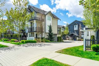 Photo 1: 56 7665 209 Street in Langley: Willoughby Heights Townhouse for sale in "Archstone Yorkson" : MLS®# R2815375
