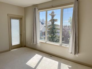 Photo 20: 1402 8000 Wentworth Drive SW in Calgary: West Springs Row/Townhouse for sale : MLS®# A1257578
