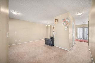 Photo 8: 38 Eversyde Common SW in Calgary: Evergreen Row/Townhouse for sale : MLS®# A1144628