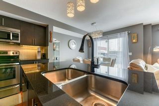 Photo 10: 11 West Coach Manor SW in Calgary: West Springs Row/Townhouse for sale : MLS®# A2035861
