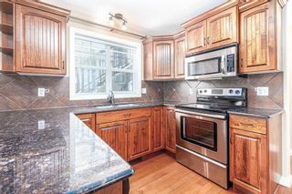 Photo 2: 1 5422 53 Street: Lacombe Semi Detached (Half Duplex) for sale : MLS®# A2022891