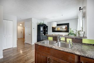Photo 13: 3408 56 Street NE in Calgary: Temple Row/Townhouse for sale : MLS®# A2024556