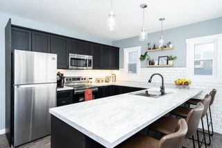Photo 4: 860 McDermot Avenue in Winnipeg: West End Residential for sale (5A)  : MLS®# 202001298