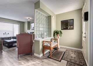 Photo 2: 45 River Rock Court SE in Calgary: Riverbend Detached for sale : MLS®# A2028065