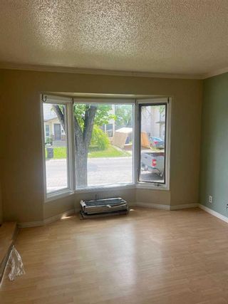 Photo 7: 58 Castleglen Road NE in Calgary: Castleridge Semi Detached (Half Duplex) for sale : MLS®# A2143077