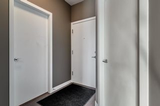 Photo 3: 411 28 Auburn Bay Link SE in Calgary: Auburn Bay Apartment for sale : MLS®# A2015310