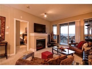 Photo 3: 413 2969 WHISPER Way in Coquitlam: Westwood Plateau Condo for sale in "Summerlin at Silver Spring" : MLS®# V1040932