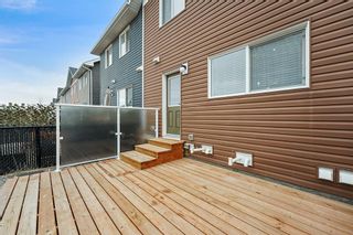 Photo 31: 119 Fireside Parkway: Cochrane Row/Townhouse for sale : MLS®# A2027901