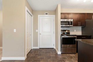 Photo 5: 6406 403 Mackenzie Way SW: Airdrie Apartment for sale : MLS®# A2108233