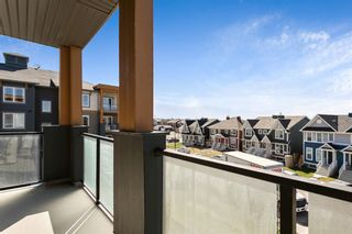 Photo 1: 308 150 Auburn Meadows Manor SE in Calgary: Auburn Bay Apartment for sale : MLS®# A1208330