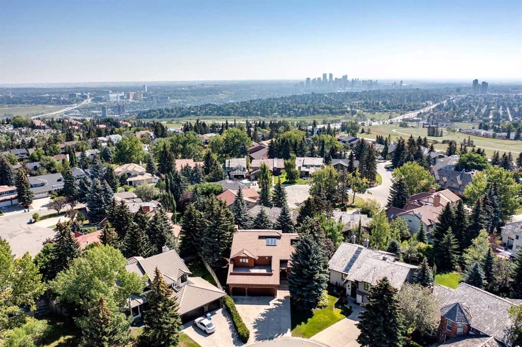 Main Photo: 128 Coach Grove Place SW in Calgary: Coach Hill Detached for sale : MLS®# A2078681