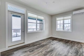 Photo 3: 217 8355 19 Avenue SW in Calgary: Springbank Hill Apartment for sale : MLS®# A2109556