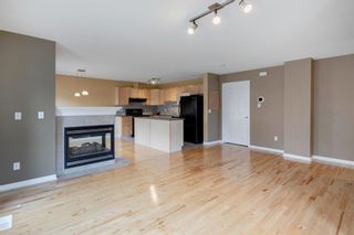 Photo 7: 180 Simcoe Place SW in Calgary: Signal Hill Row/Townhouse for sale : MLS®# A1218089