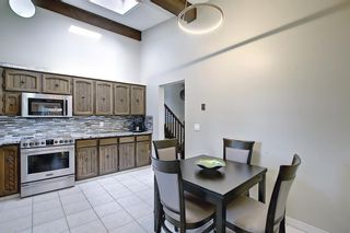 Photo 10: 335 Queensland Place SE in Calgary: Queensland Detached for sale : MLS®# A1137041