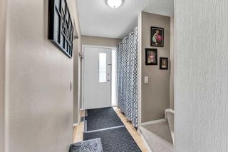 Photo 2: 84 2511 38 Street NE in Calgary: Rundle Row/Townhouse for sale : MLS®# A2072497