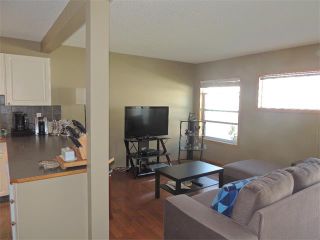 Photo 4: 37 MILLVIEW Green SW in Calgary: Millrise House for sale : MLS®# C4015611