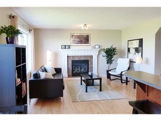 Photo 10: 772 LUXSTONE Landing SW: Airdrie House for sale : MLS®# C4016201