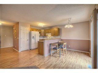 Photo 5: 260 HARVEST CREEK Court NE in CALGARY: Harvest Hills Residential Detached Single Family for sale (Calgary)  : MLS®# C3633945