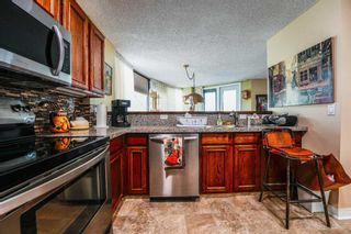 Photo 11: 144 10 Coachway Road SW in Calgary: Coach Hill Apartment for sale : MLS®# A2069089
