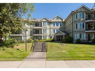 Photo 1: 104 20881 56 AVENUE in Langley: Langley City Condo for sale : MLS®# R2564873