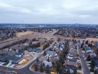 Photo 13: 18 Straddock Bay SW in Calgary: Strathcona Park Detached for sale : MLS®# A1165307